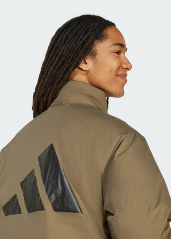 Зелена демісезонна пуховик essentials climawarm puffer adidas