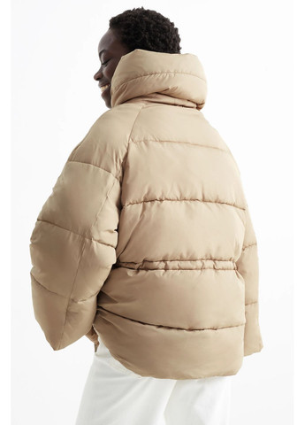 Бежева демісезонна стеганна куртка C&A