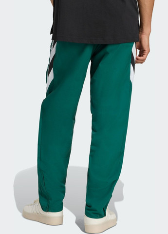 Зеленые спортивные демисезонные брюки adidas