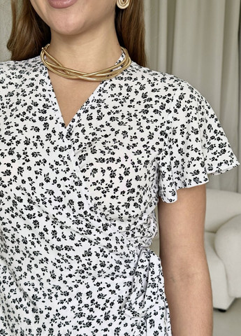 Білий пляжна, повсякденний, кежуал, коктейльна літня легка сукня на запах в квіточку зі штапелю на запах Merlini леопардовий