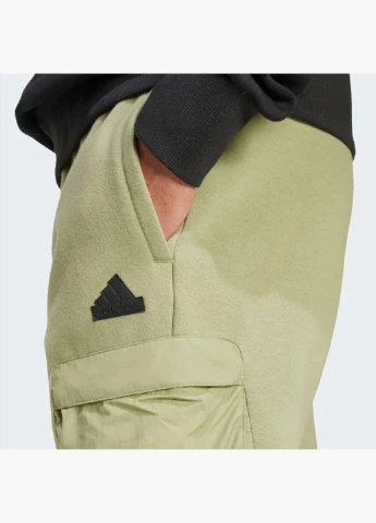 Оливковые демисезонные брюки adidas