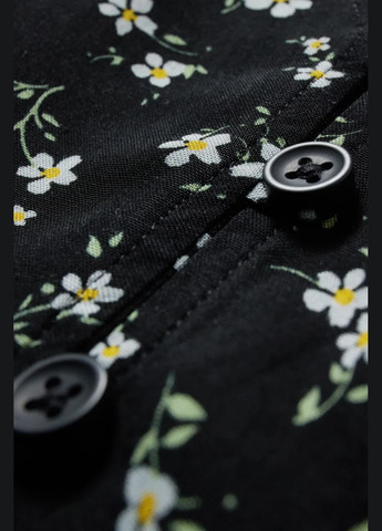 Чорна кежуал сукня в квітковий принт C&A однотонна