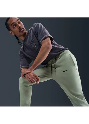 Оливковые демисезонные брюки Nike