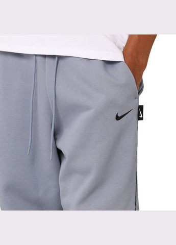 Голубые демисезонные брюки Nike
