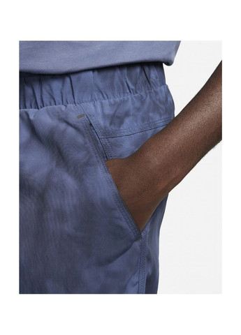 Синие демисезонные брюки Nike